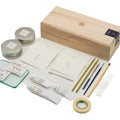 Advanced Kintsugi Kit - overhead view of the full kit laid out with its wooden box, tins, brushes, tape, tools and instruction cards