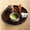 Ao-Oribe matcha bowl (chawan) - lifestyle view holding whisked matcha on a tray