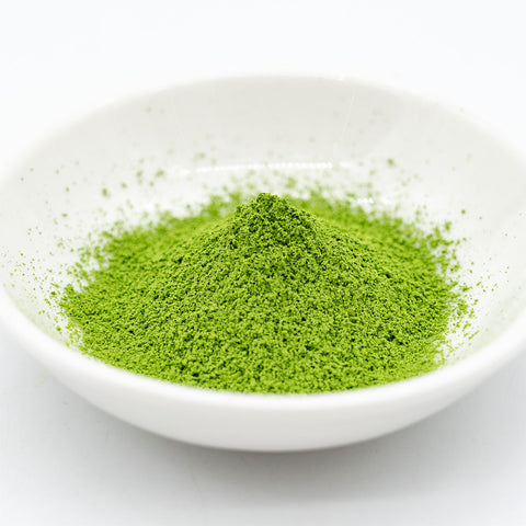 Hika - Shiga Matcha - angled view of the green matcha powder in a white dish