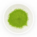 Hika - Shiga Matcha - overhead view of the bright green matcha powder in a white dish
