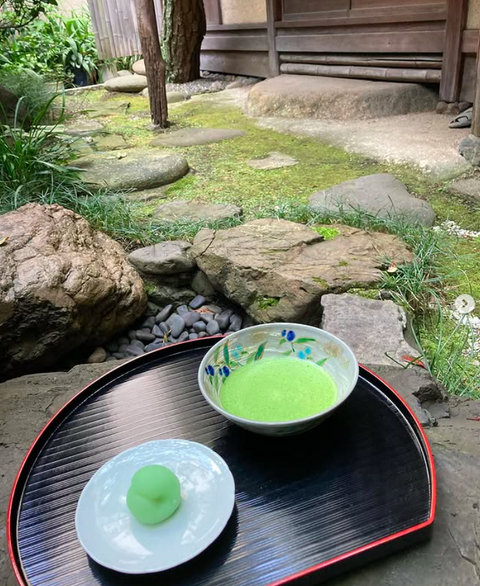 Bowl of matcha in a garden