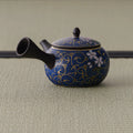 Blue-floral kyusu with the spout angled to the left