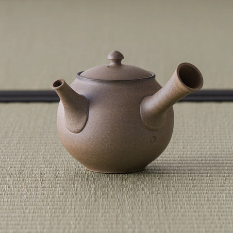 Grey-brown kyusu with the spout angled to the left