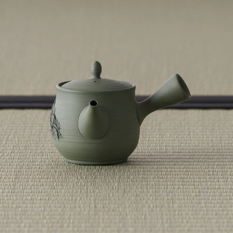 Opposite-side view of the green celadon kyusu with the spout to the left