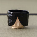 Oharagi Seto-guro matcha bowl, front view of the glossy black cylindrical bowl