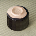Oharagi Seto-guro matcha bowl, underside view showing the unglazed clay foot