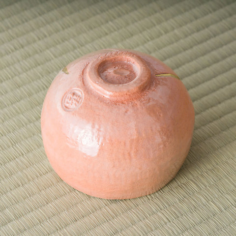 Aka-raku Seppo red raku matcha bowl, underside view showing the foot