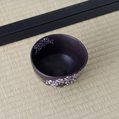 Black Weeping Sakura Chawan photographed at an angle from above, looking into the empty bowl