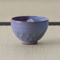 Undecorated side of the Purple Weeping Sakura Chawan, showing faceted panels beneath a soft blue-violet glaze