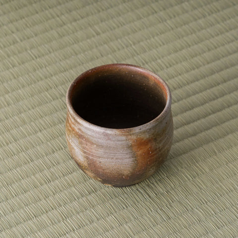 High angle looking into the wood-fired yunomi showing the interior and rim