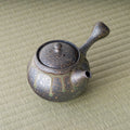 Overhead view of the kyusu showing the lid, knob and side handle