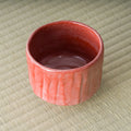 Aka-raku Komachi red raku matcha bowl, overhead view into the red glazed interior