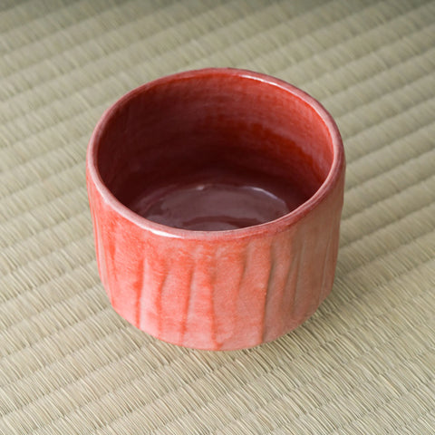 Aka-raku Komachi red raku matcha bowl, overhead view into the red glazed interior