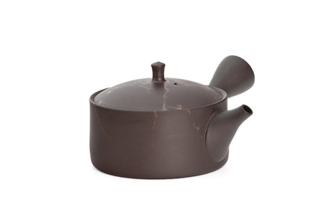 Brown ceramic teapot on a white background