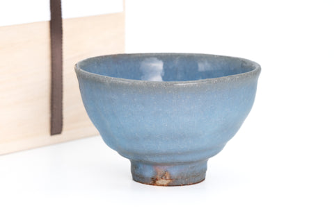 Blue ceramic bowl on a white background