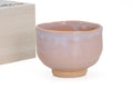 Hagi-yaki Hantsutsu-gata Chawan - front view of the beige chawan beside its wooden box