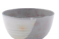 Side view showing the glaze gradient and faint pink gohon spots.
