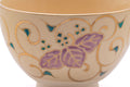 Close-up of a purple paulownia motif on the bowl.
