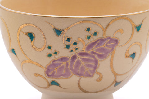 Close-up of a purple paulownia motif on the bowl.