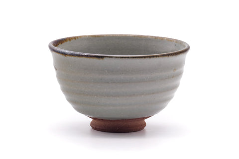 Front view showing the grey glaze and dark brushed motif.