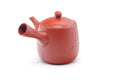 Top view of the teapot showing the side handle, spout and lid.