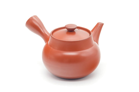 Front-on view showing the spout, side handle, and rounded body.