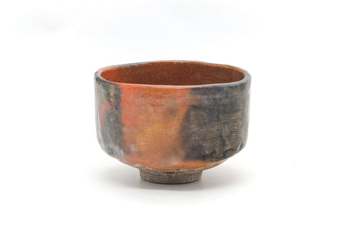 Front view of the raku chawan showing its variegated fired colours.
