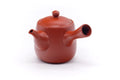 View of the teapot with the side handle facing the viewer.