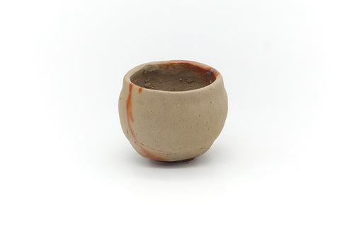 Front view of the Bizen yunomi showing the cup body and rim.