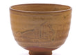 Wider view showing the incised landscape design around the lower body.