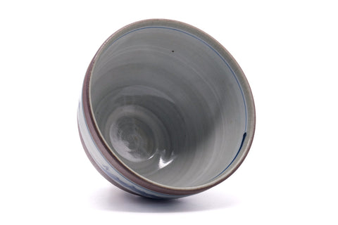 Mountainous-band chawan seen from above, looking into the pale grey glazed interior