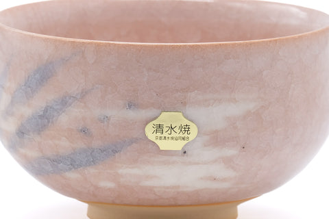 Close-up of the body showing the blue streak accents and a gold maker's seal.