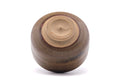 Underside of the chawan showing the foot ring and spiral-turned unglazed base.