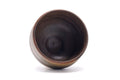 Overhead view into the bowl revealing the deep brown-black glazed interior.