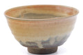 Angled view into the chawan's pale glazed interior well and rim.