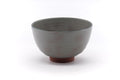 Front view of the chawan showing the grey glaze and rim.