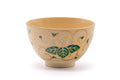 Another rotation showing a green paulownia motif on the bowl.