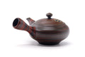 Rear three-quarter view showing the side handle of the kyusu.