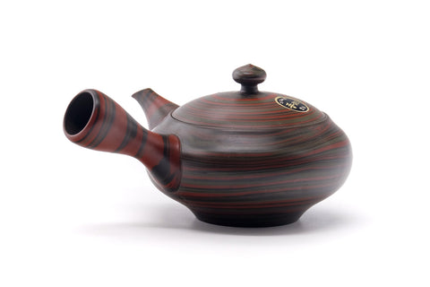 Rear three-quarter view showing the side handle of the kyusu.
