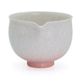 Pink Gradient Hanakessho Crystal Glaze Spouted Matcha Bowl - front view of the tall spouted chawan with white crystal glaze and pink-hued base