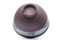 Mountainous-band chawan inverted to show the underside and trimmed foot ring (kodai)