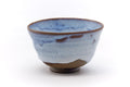 Side view of the matcha bowl showing the soft sky-blue glaze.