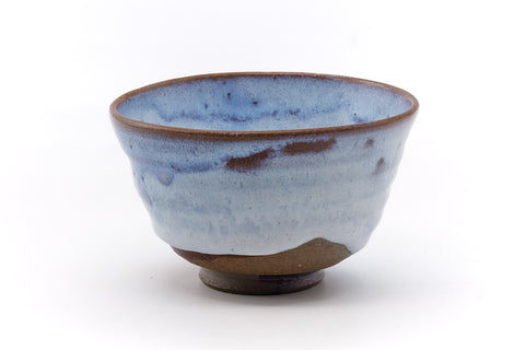 Side view of the matcha bowl showing the soft sky-blue glaze.