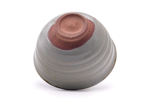 Underside of the chawan showing the reddish clay foot.