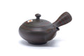 Front view of the dark nerikomi Tokoname kyusu with side handle
