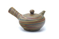 Top view of the teapot showing the side handle, spout and lid.