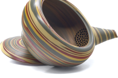 Teapot with the lid removed and set beside it, showing the interior.
