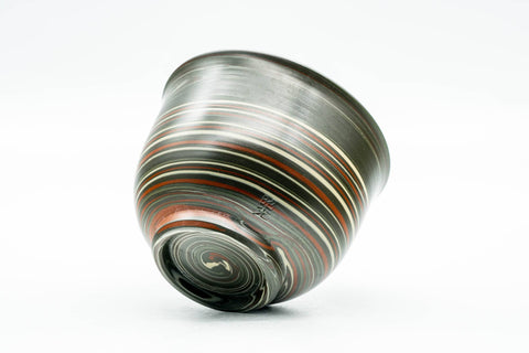 Tilted view of the nerikomi yunomi showing the marbled foot and base