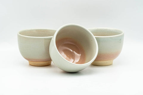 Japanese Teacups - Set of 3 Beige Pink Hagi-yaki Yunomi - 110ml - one cup tilted showing the interior among the set