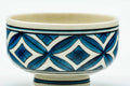 Close-up of the blue geometric lattice pattern and the interior.